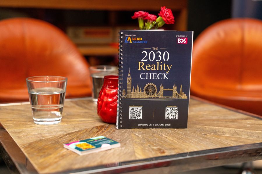 The 2030 Reality Check event notebook on a table